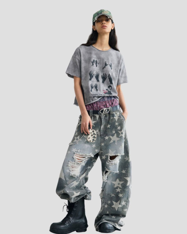 STAR-PATTERN DISTRESSED CURVED PANTS