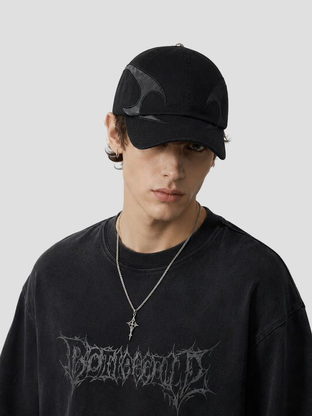 None Unit Arc Panel Washed Baseball Cap in black male model front view