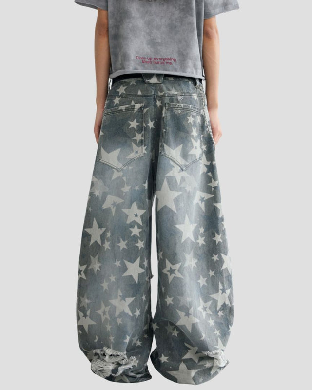STAR-PATTERN DISTRESSED CURVED PANTS