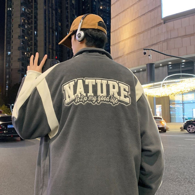 Detail shot of the embroidery work on the jacket.