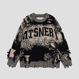 Front view of the Distressed Jacquard Sweater showcasing its design.