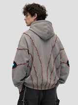 None Unit Abyss Eye Embroidered Hoodie in gray male model back view