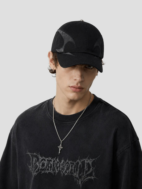 None Unit Arc Panel Washed Baseball Cap in black male model front view