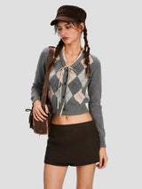 None Unit Argyle Bow Cropped Cardigan in heather gray female model front view