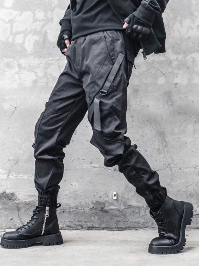 None Unit black strap cargo jogger pants side view with webbing strap