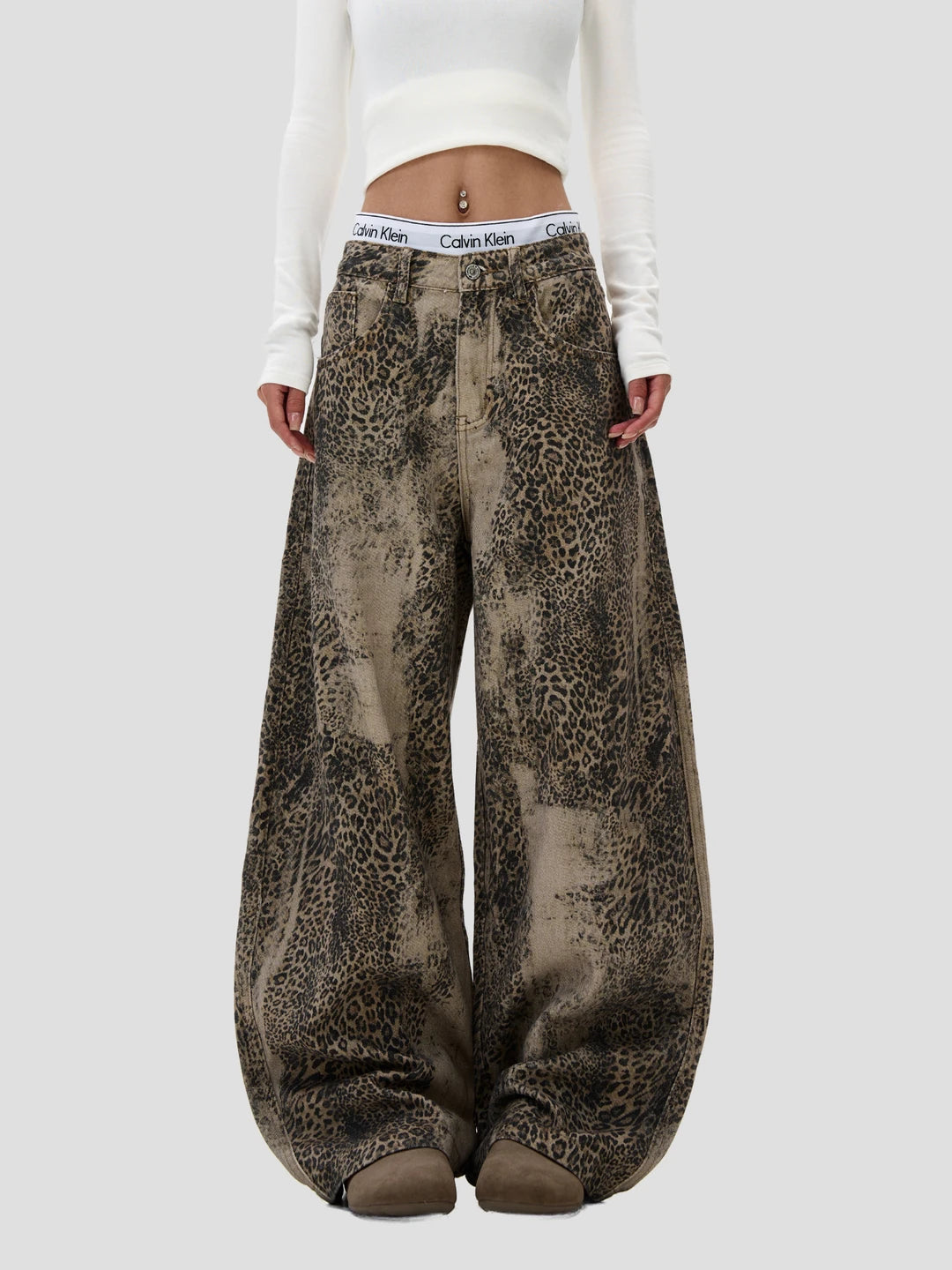 None Unit Leopard Wash Barrel Jeans in brown female model front view