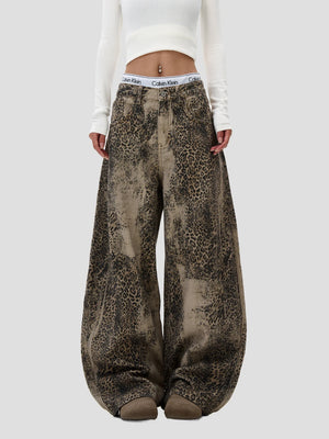 None Unit Leopard Wash Barrel Jeans in brown female model front view