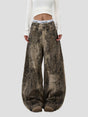 None Unit Leopard Wash Barrel Jeans in brown female model front view