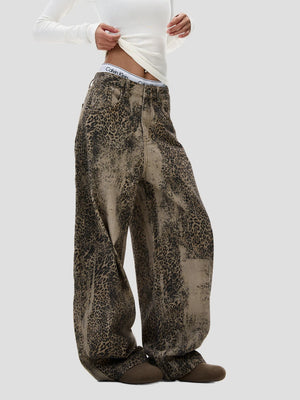 None Unit Leopard Wash Barrel Jeans in brown female model side view