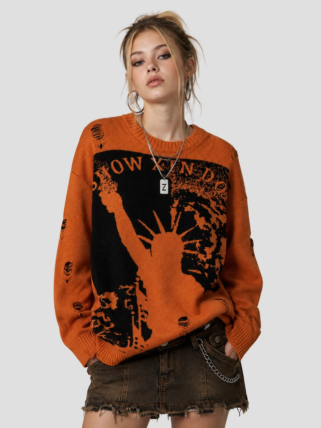 None Unit Liberty Hand Distressed Graphic Sweater in orange female model front view