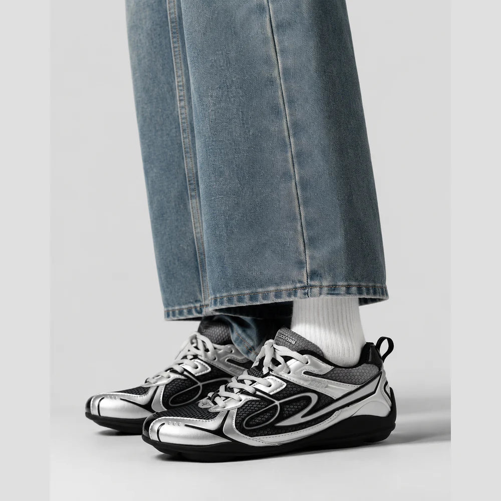 None Unit Meteor Wave Low Sneaker in meteor silver on-foot side view