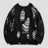 None Unit Rupture Knit Oversized Sweater in black product front view