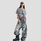 STAR-PATTERN DISTRESSED CURVED PANTS